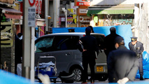 Vehicle plows into New Year's crowd in Tokyo, injures eight people