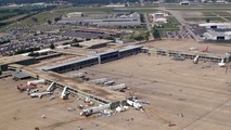 Tulsa Airport installs electric vehicle charging stations in a parking garage