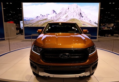 Global carmakers gear up for China’s auto show as sector opens