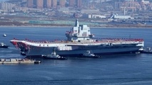 China’s Secretive Home-Built Aircraft Carrier Sets Out for Sea Trials
